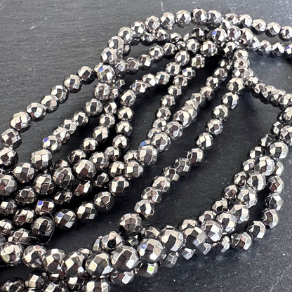 4mm silver electroplated hematite - round - faceted - 15" strand - approx. 100 beads