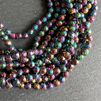4mm rainbow electroplated hematite - round - faceted - 15" strand - approx. 100 beads
