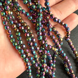 4mm rainbow electroplated hematite - round - faceted - 15" strand - approx. 100 beads