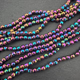 4mm rainbow electroplated hematite - round - faceted - 15" strand - approx. 100 beads