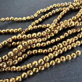 4mm gold electroplated hematite beads - round - faceted - 15" strand - approx. 100 beads