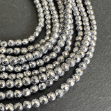 4mm platinum silver electroplated hematite beads - round - faceted - 15" strand - approx. 100 beads