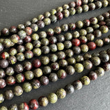 6mm dragon blood jasper beads - round - smooth - 15" strand - approx. 65 beads