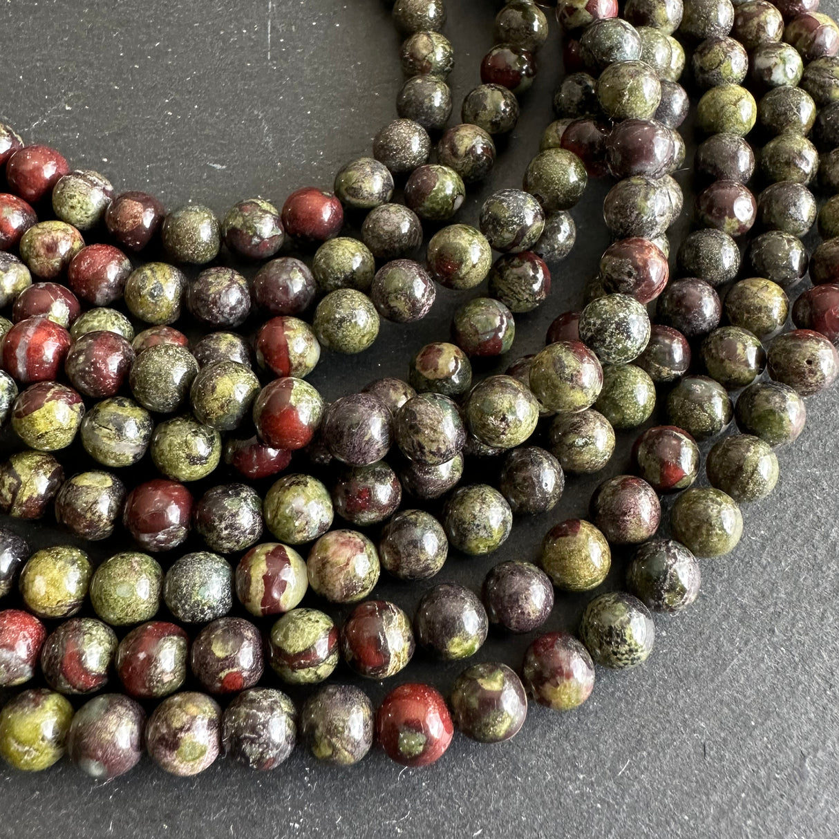 6mm dragon blood jasper beads - round - smooth - 15" strand - approx. 65 beads