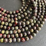 6mm dragon blood jasper beads - round - smooth - 15" strand - approx. 65 beads