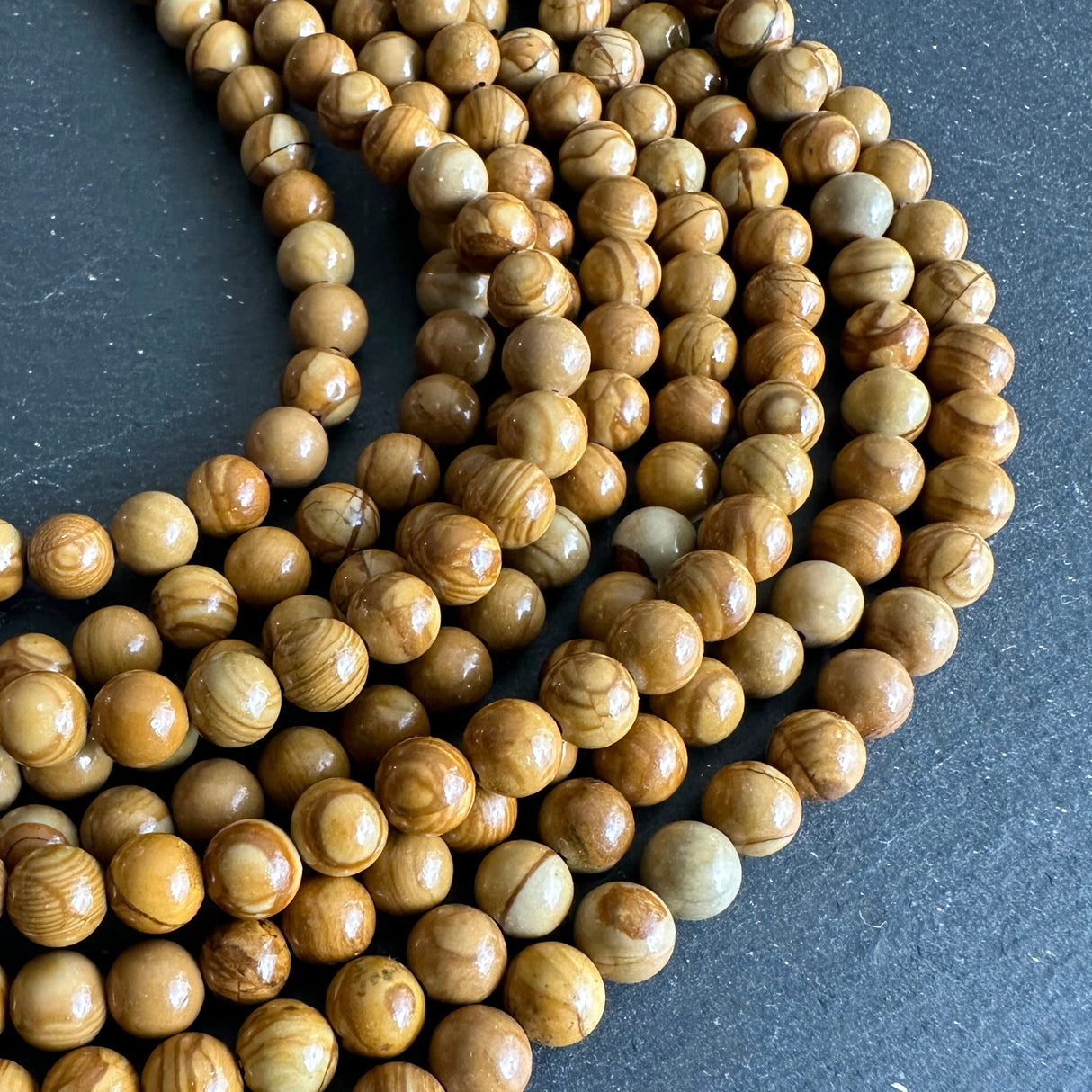 6mm wood jasper beads (undyed) - round - smooth - 15" strand - approx. 65 beads