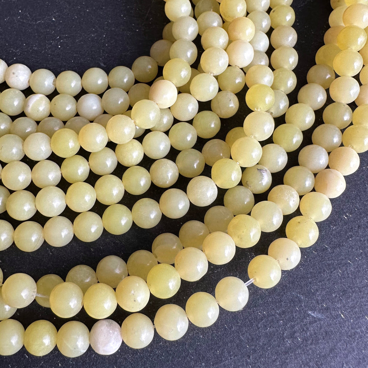 6mm lemon jade beads - round - smooth - 15" strand - approx. 65 beads