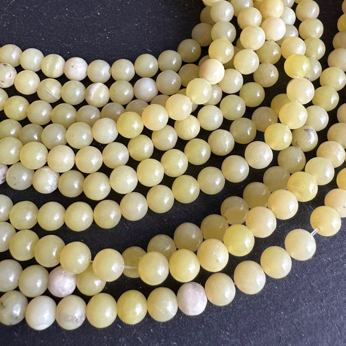 6mm lemon jade beads - round - smooth - 15" strand - approx. 65 beads