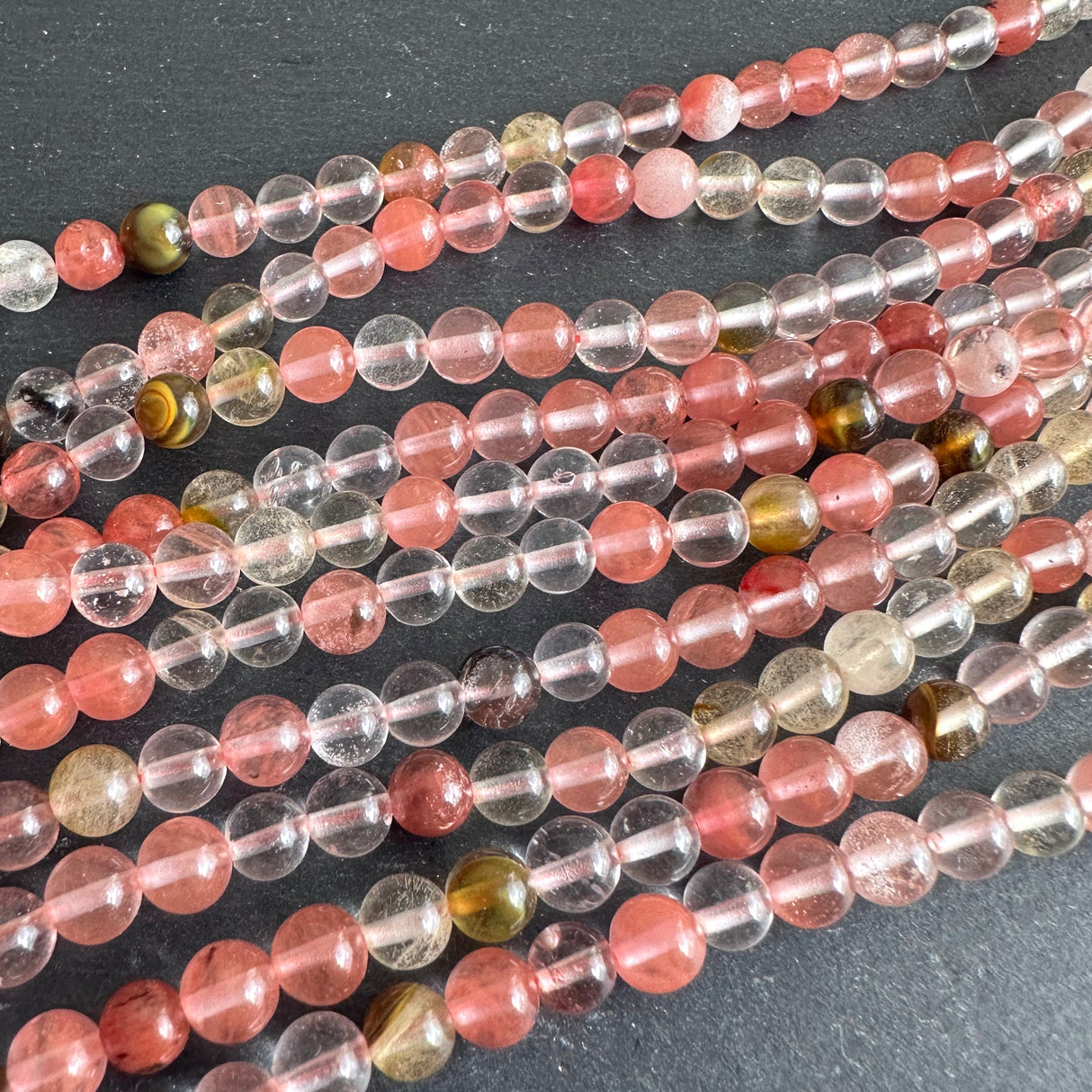 6mm tigerskin glass beads - round - smooth - 15" strand - approx. 65 beads