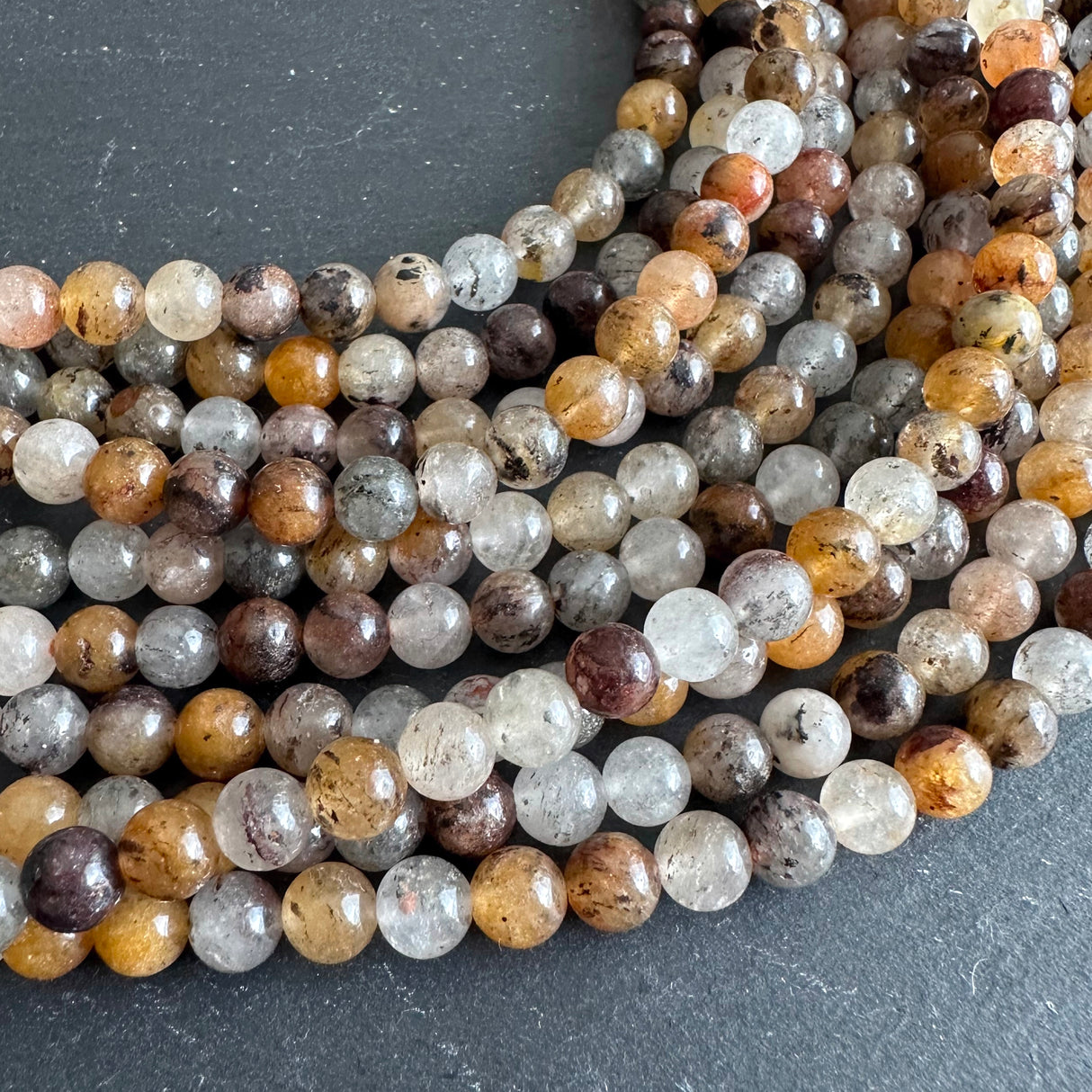 6mm lodolite beads - round - smooth - 15" strand - approx. 65 beads