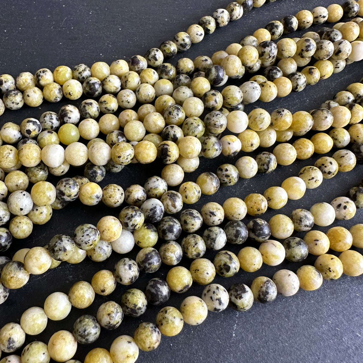 6mm yellow turquoise beads- round - smooth - 15" strand - approx. 65 beads