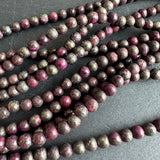 6mm pink pyrite stone beads - round - smooth - 15" strand - approx. 65 beads