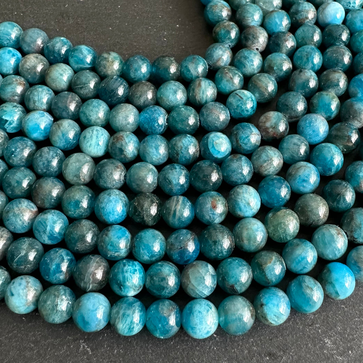 6mm blue apatite beads - round - smooth - 15" strand - approx. 65 beads