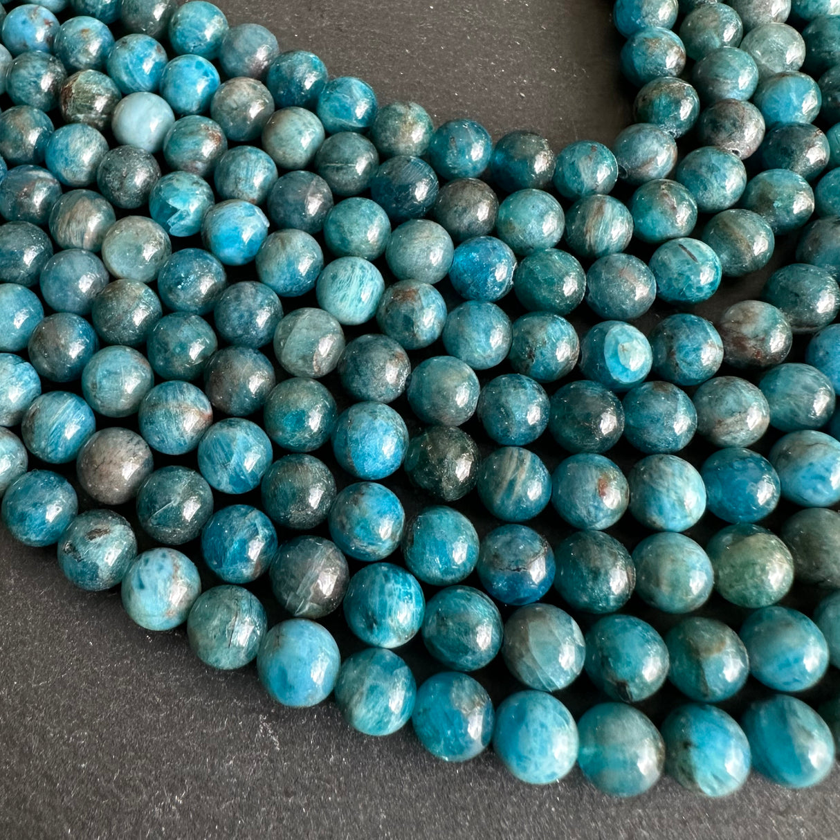 6mm blue apatite beads - round - smooth - 15" strand - approx. 65 beads