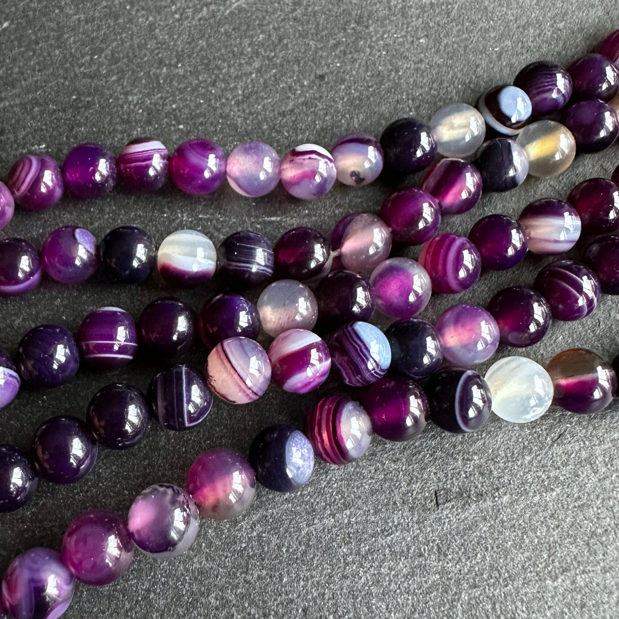 6mm purple striped agate beads - round - smooth - 15" strand - approx. 60 beads