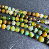 6mm yellow green striped agate beads - round - smooth - 15" strand - approx. 60 beads