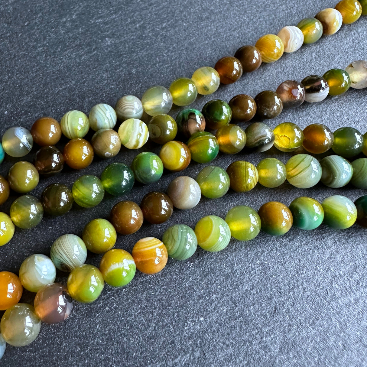 6mm yellow green striped agate beads - round - smooth - 15" strand - approx. 60 beads