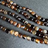 6mm dark brown striped agate beads - round - smooth - 15" strand - approx. 60 beads