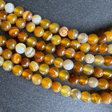 6mm honey gold striped agate beads - round - smooth - 15" strand - approx. 60 beads