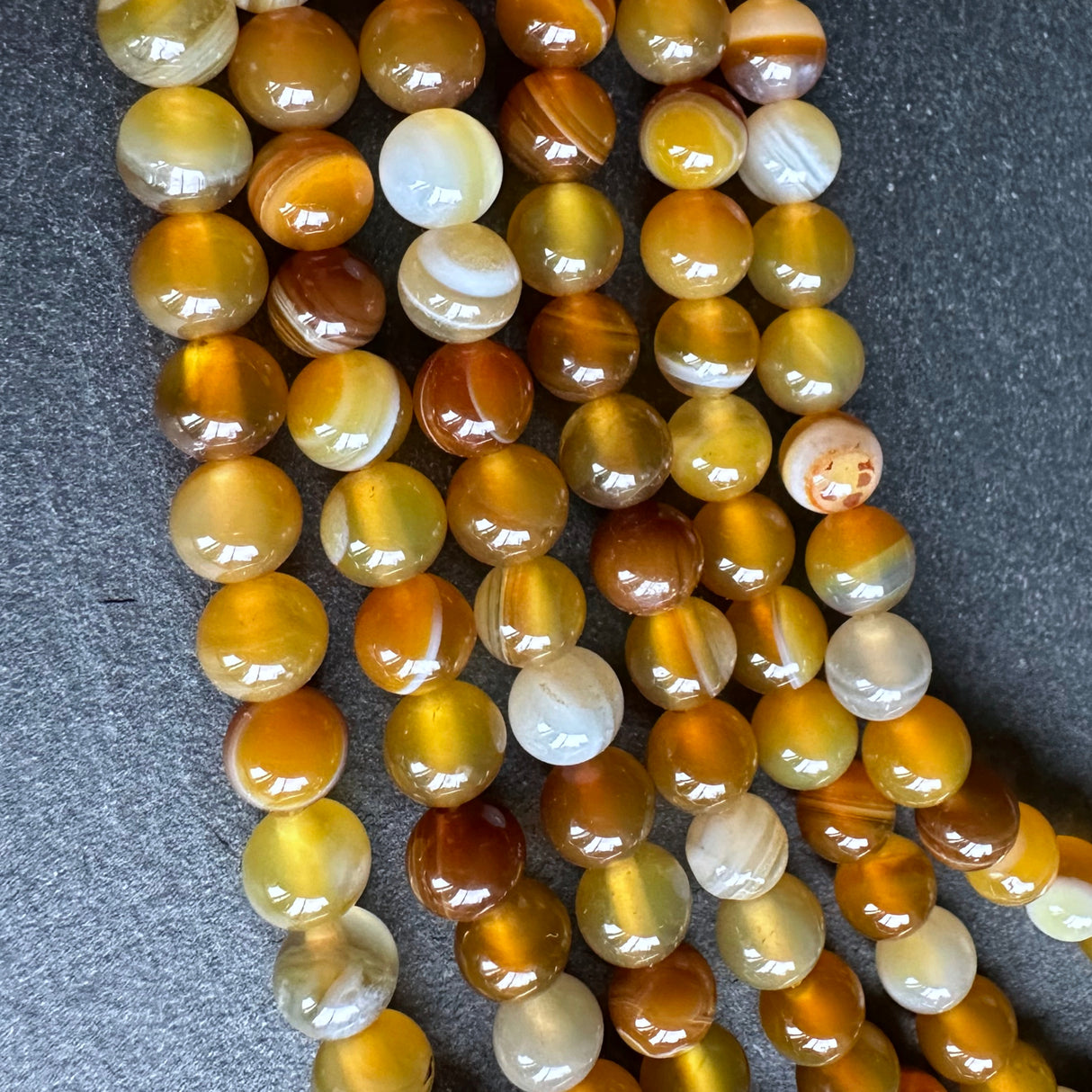 6mm honey gold striped agate beads - round - smooth - 15" strand - approx. 60 beads