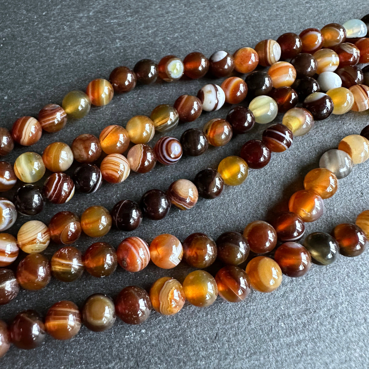 6mm golden brown striped agate beads - round - smooth - 15" strand - approx. 60 beads ST1-15