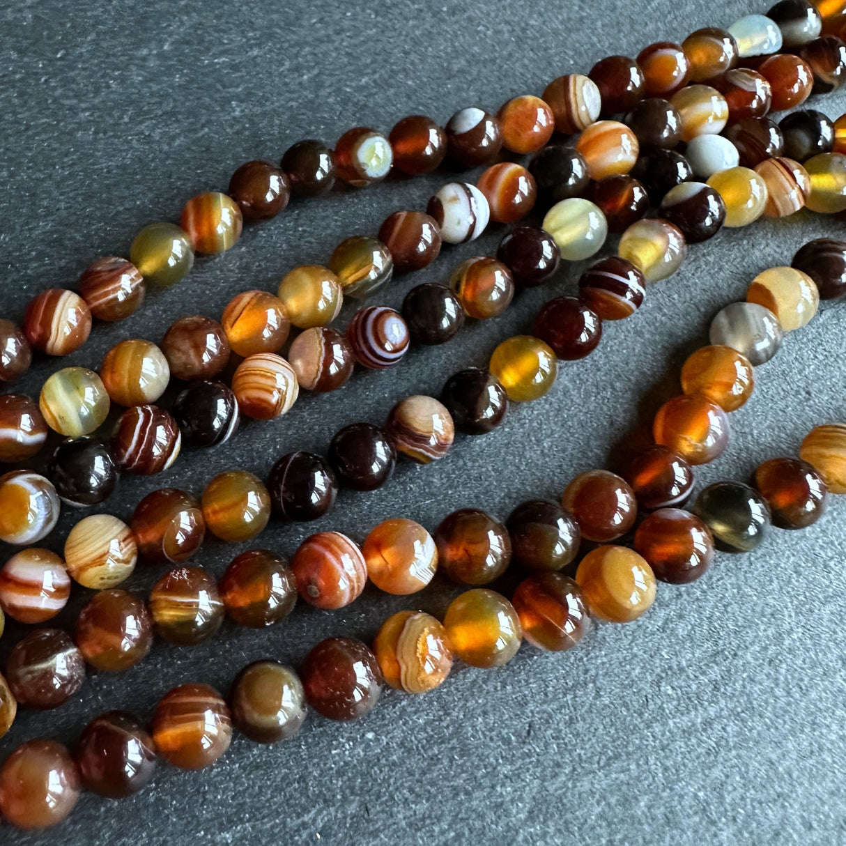 6mm golden brown striped agate beads - round - smooth - 15" strand - approx. 60 beads ST1-15