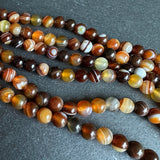 6mm golden brown striped agate beads - round - smooth - 15" strand - approx. 60 beads ST1-15