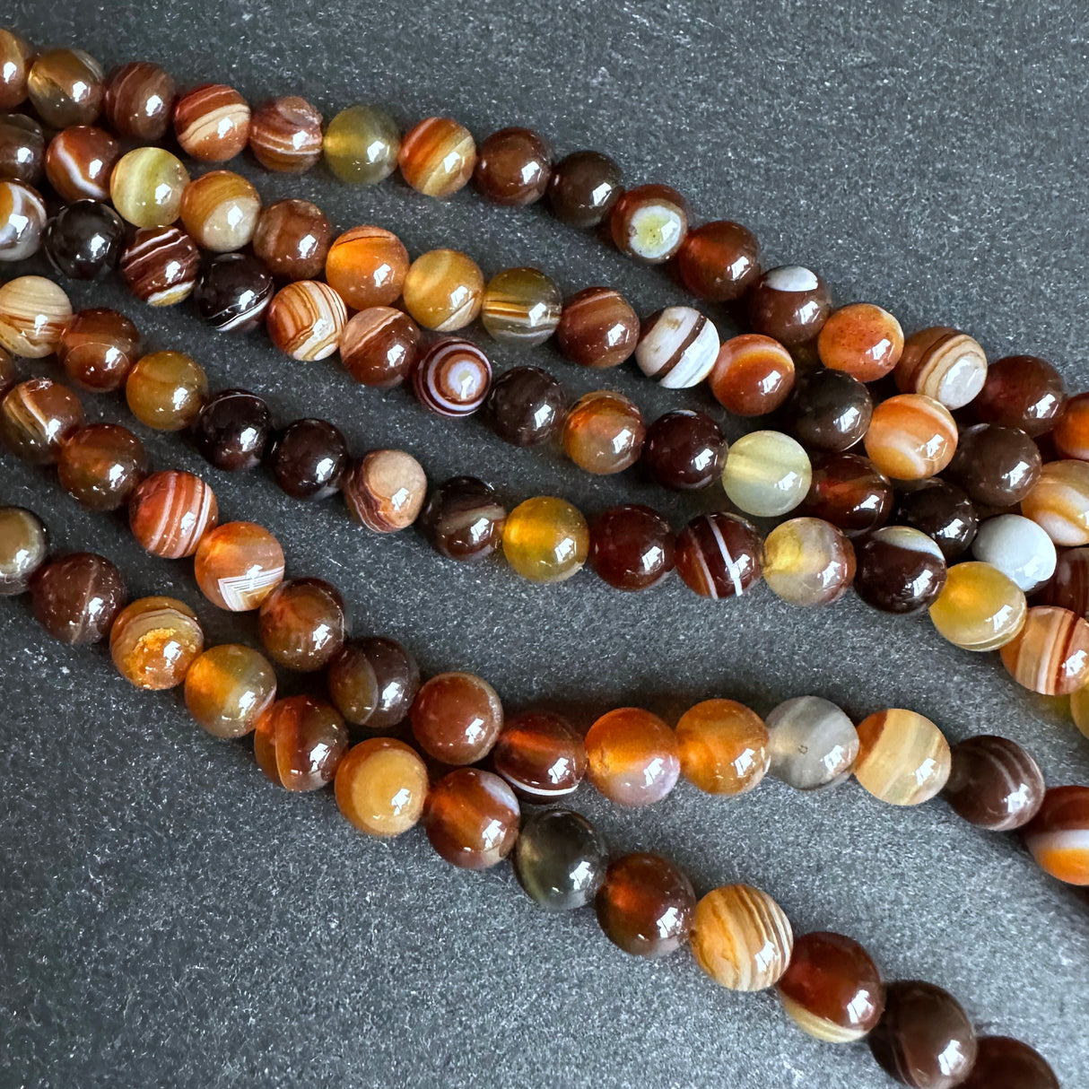 6mm golden brown striped agate beads - round - smooth - 15" strand - approx. 60 beads ST1-15