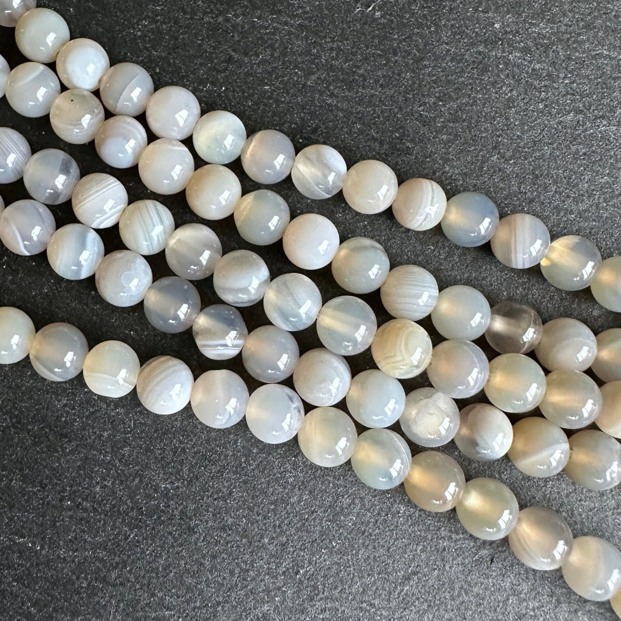 6mm light gray striped agate beads - round - smooth - 15" strand - approx. 60 beads