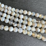 6mm light gray striped agate beads - round - smooth - 15" strand - approx. 60 beads