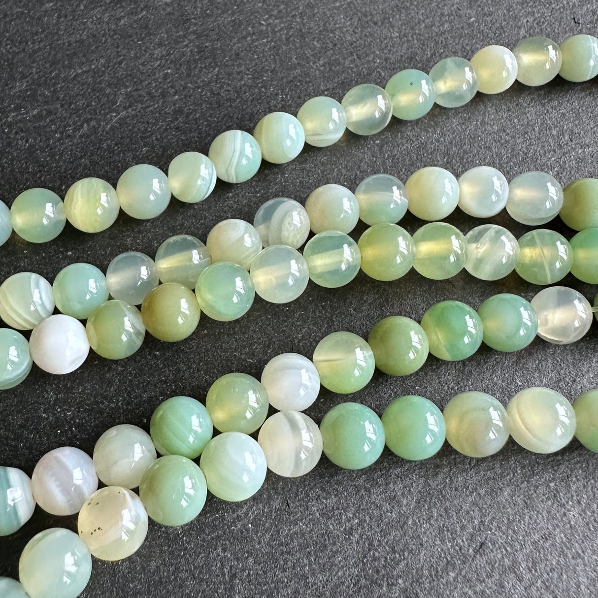 6mm light green striped agate beads - round - smooth - 15" strand - approx. 60 beads ST1-11