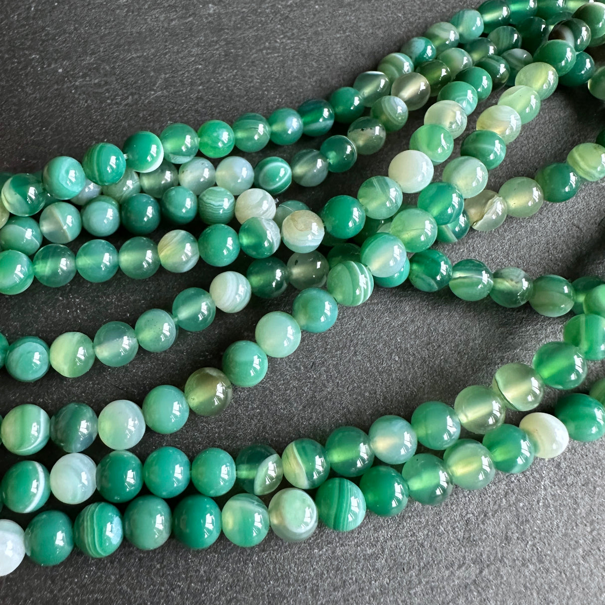 6mm seagreen striped agate beads - round - smooth - 15" strand - approx. 60 beads