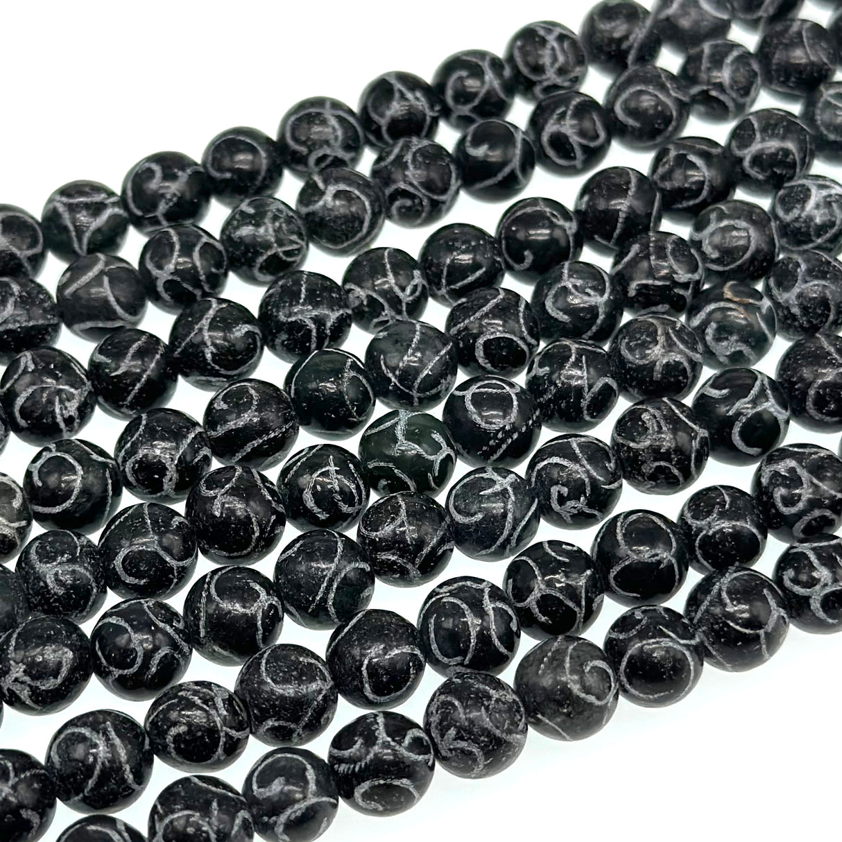 8mm black jade - round - carved - 15" strand - approx. 50 baeds