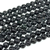 8mm black jade - round - carved - 15" strand - approx. 50 baeds