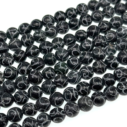 8mm black jade - round - carved - 15" strand - approx. 50 baeds