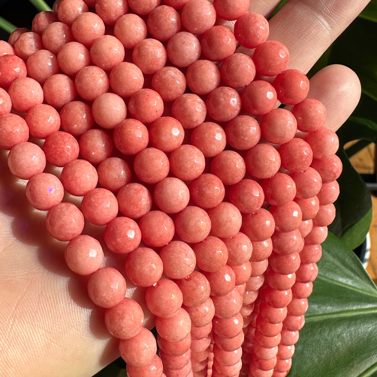 8mm coral candy jade (quartz) - round- faceted (dyed)