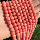 8mm coral candy jade (quartz) - round- faceted (dyed)