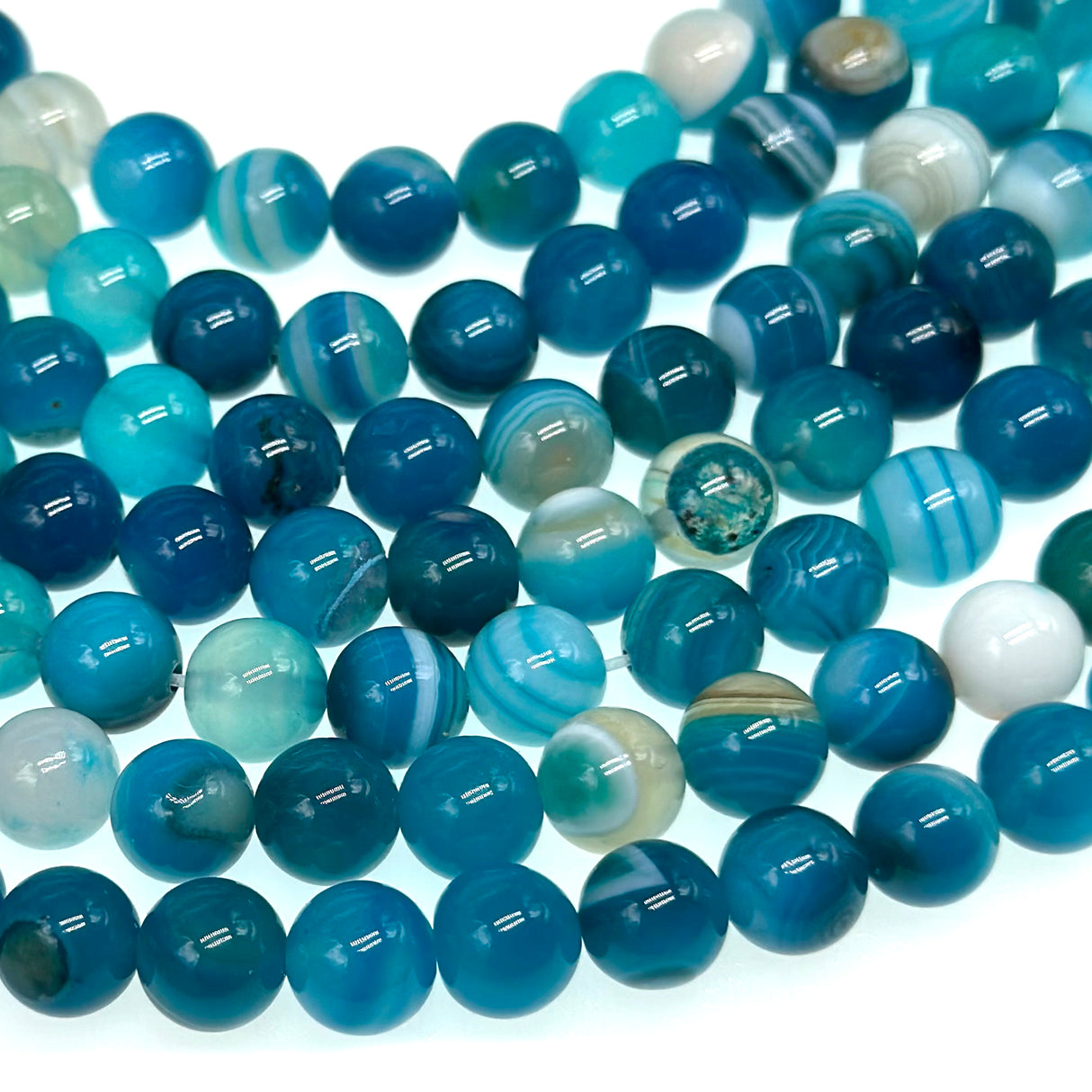 8mm blue striped agate beads (dyed) - round - smooth - 15" strand - approx. 50 beads