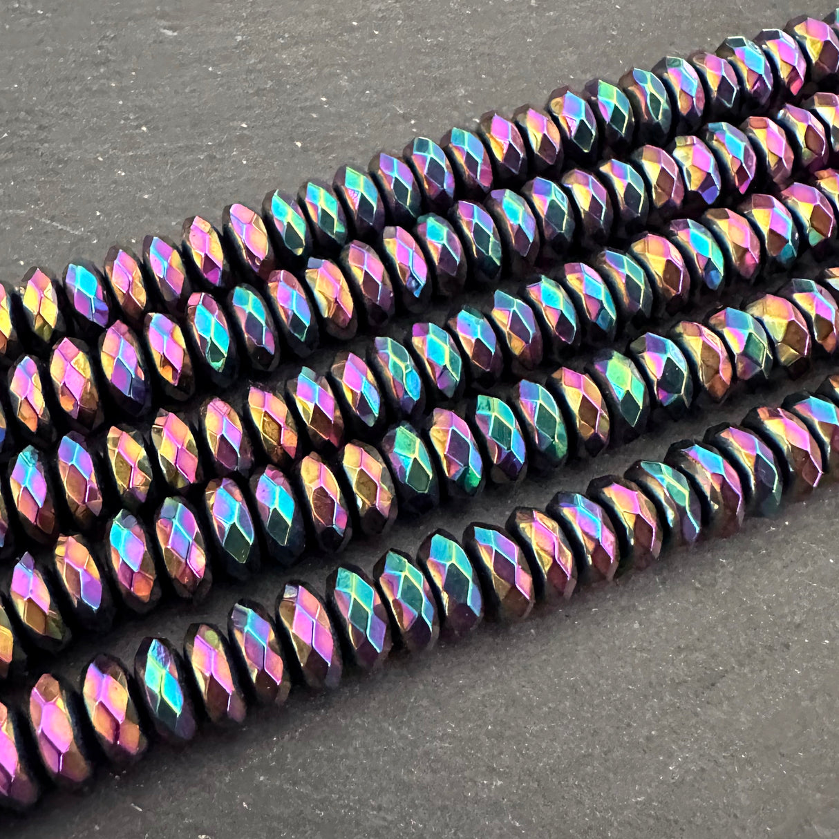 6mm rainbow electroplated hematite beads - rondelle - faceted - 15" strand - approx. 100 beads