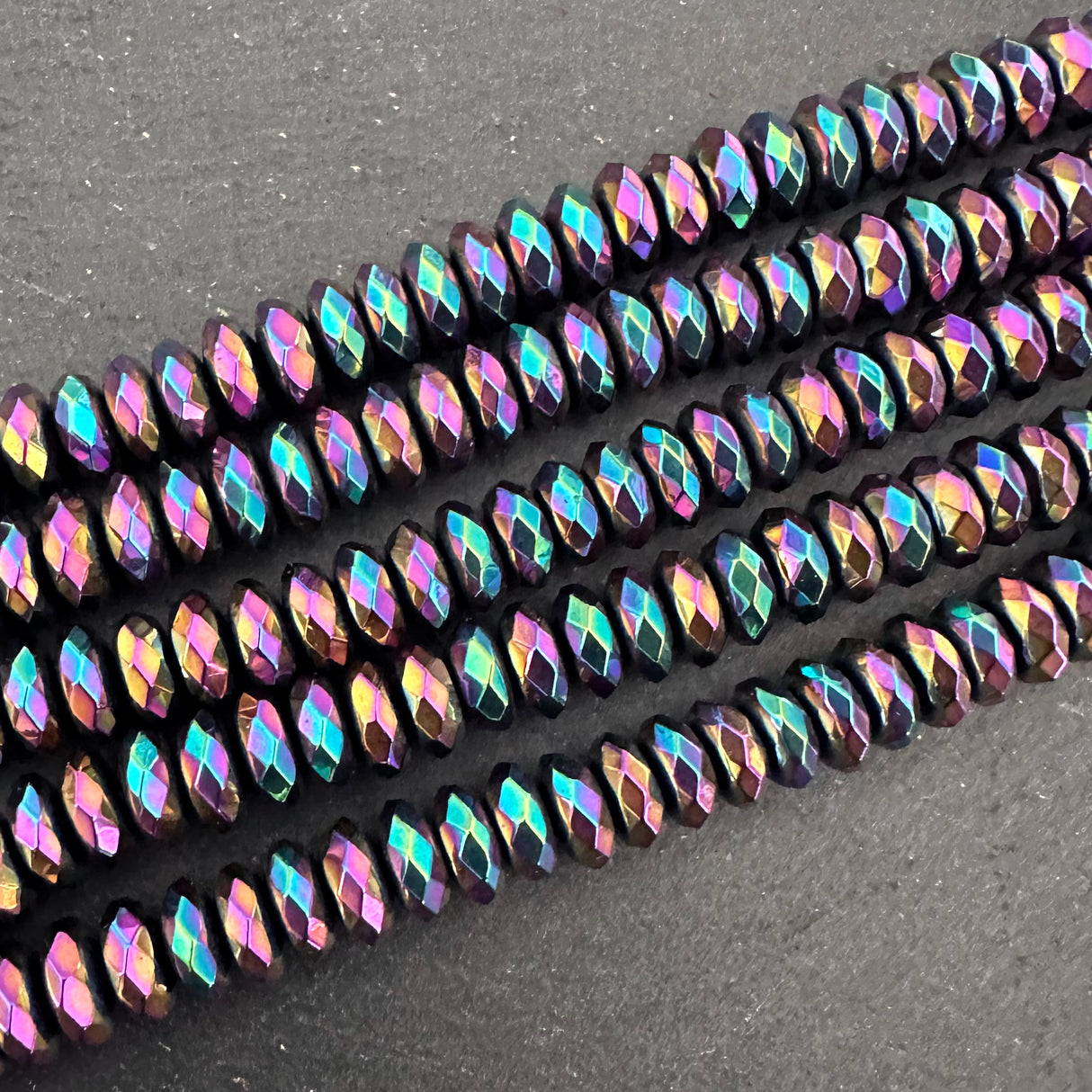 6mm rainbow electroplated hematite beads - rondelle - faceted - 15" strand - approx. 100 beads