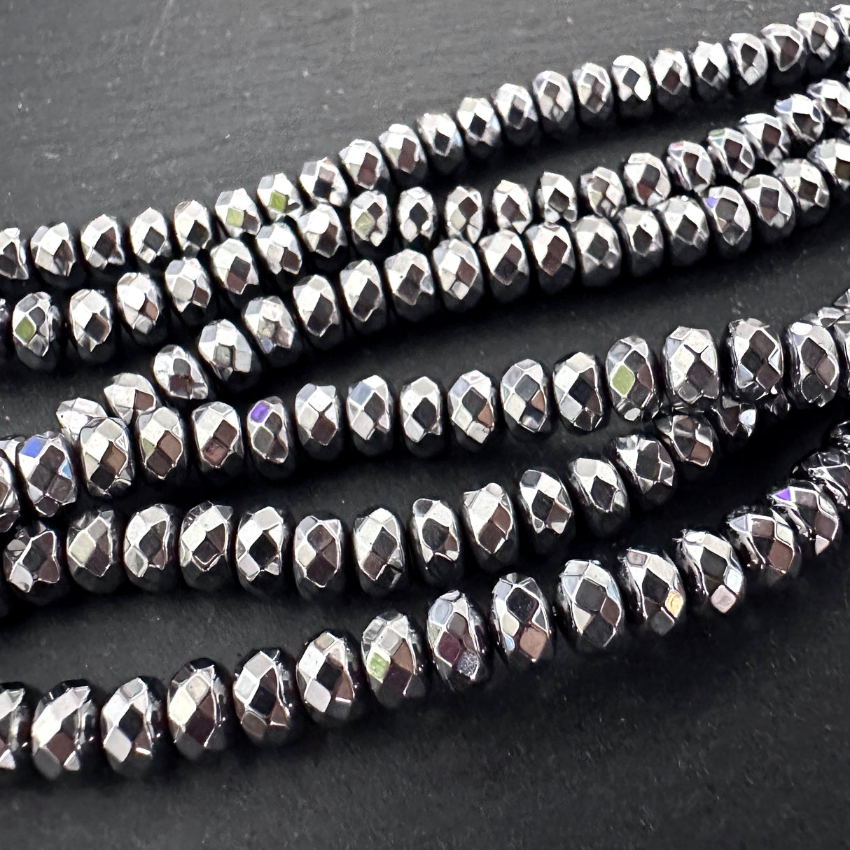 6x3mm silver electroplated hematite beads - rondelle - faceted - 15" strand - approx. 65 beads