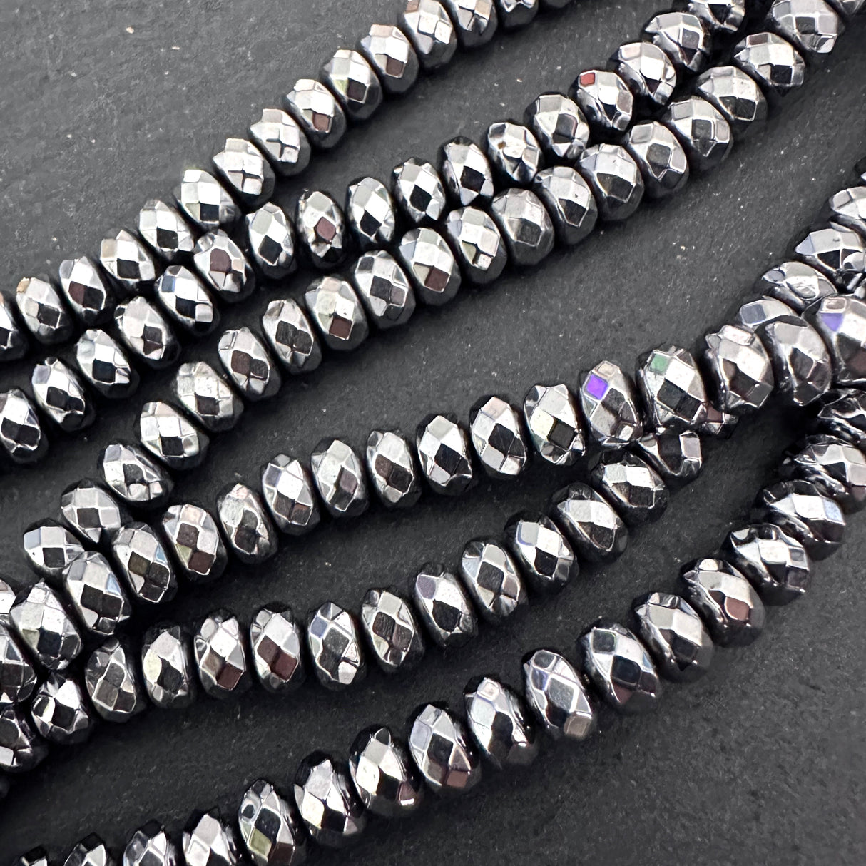 6x3mm silver electroplated hematite beads - rondelle - faceted - 15" strand - approx. 65 beads