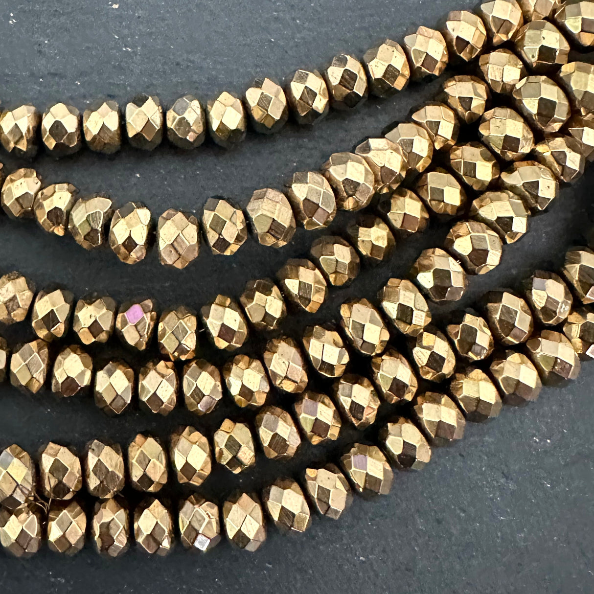 6mm gold electroplated hematite beads - rondelle - faceted - 15" strand - approx. 100 beads