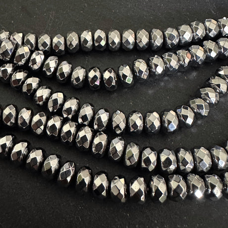 6mm platinum silver electroplated hematite - rondelle - faceted - 15" strand - approx. 65 beads