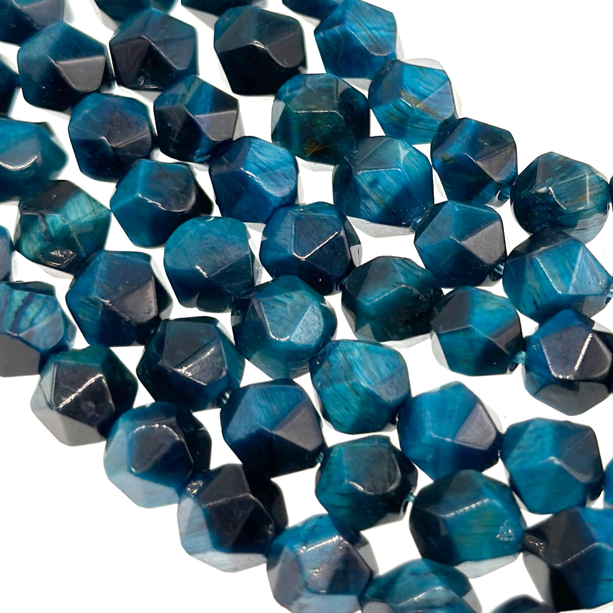 8mm cyan tiger eye beads (dyed)  - star cut - faceted - 15" strand - approx. 45 beads