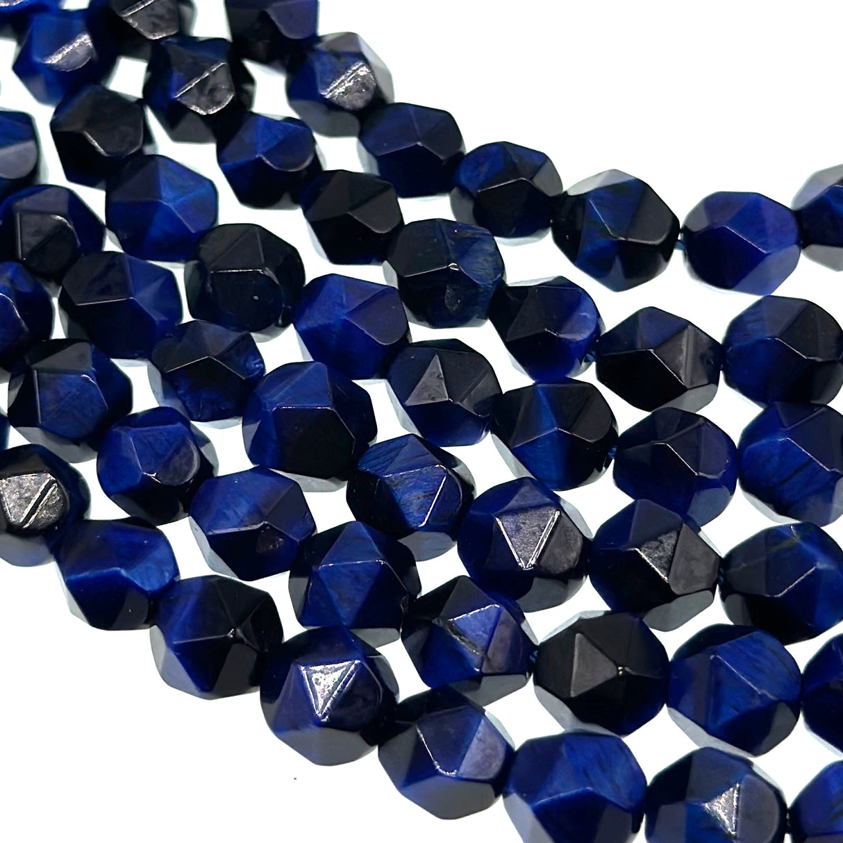 8mm dark blue tiger eye - star cut - faceted - 15" strand - approx. 45 beads