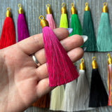 3" magenta gold top tassel