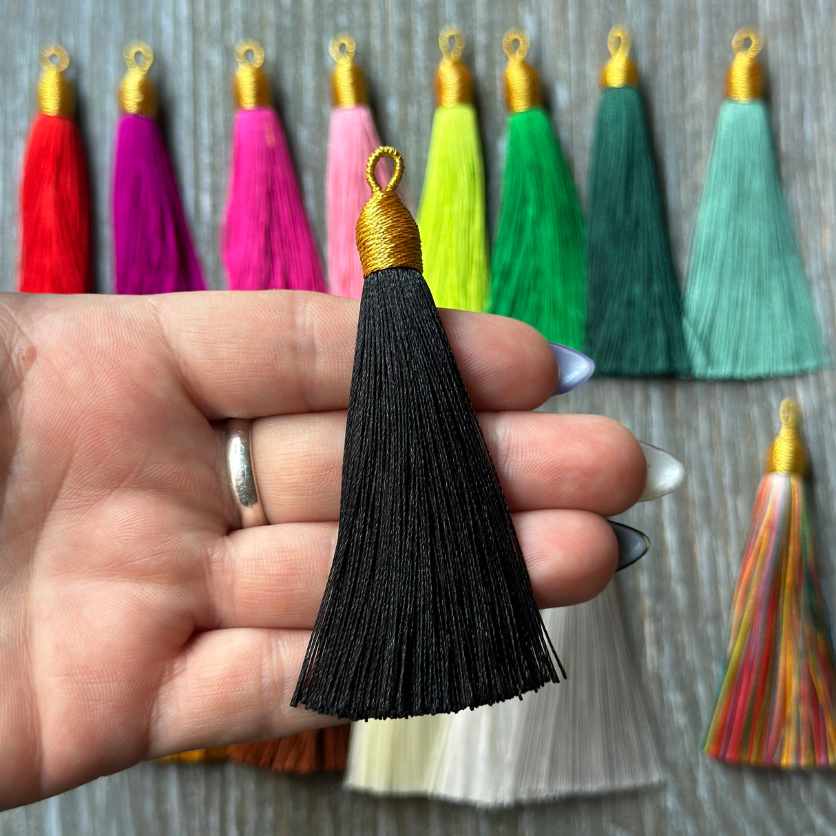 3"  black gold top tassel